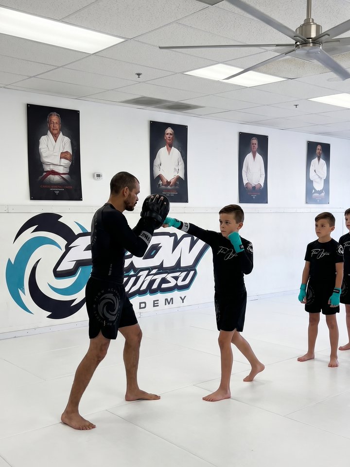 Muay Thai pad work class at Flow Academy Indio